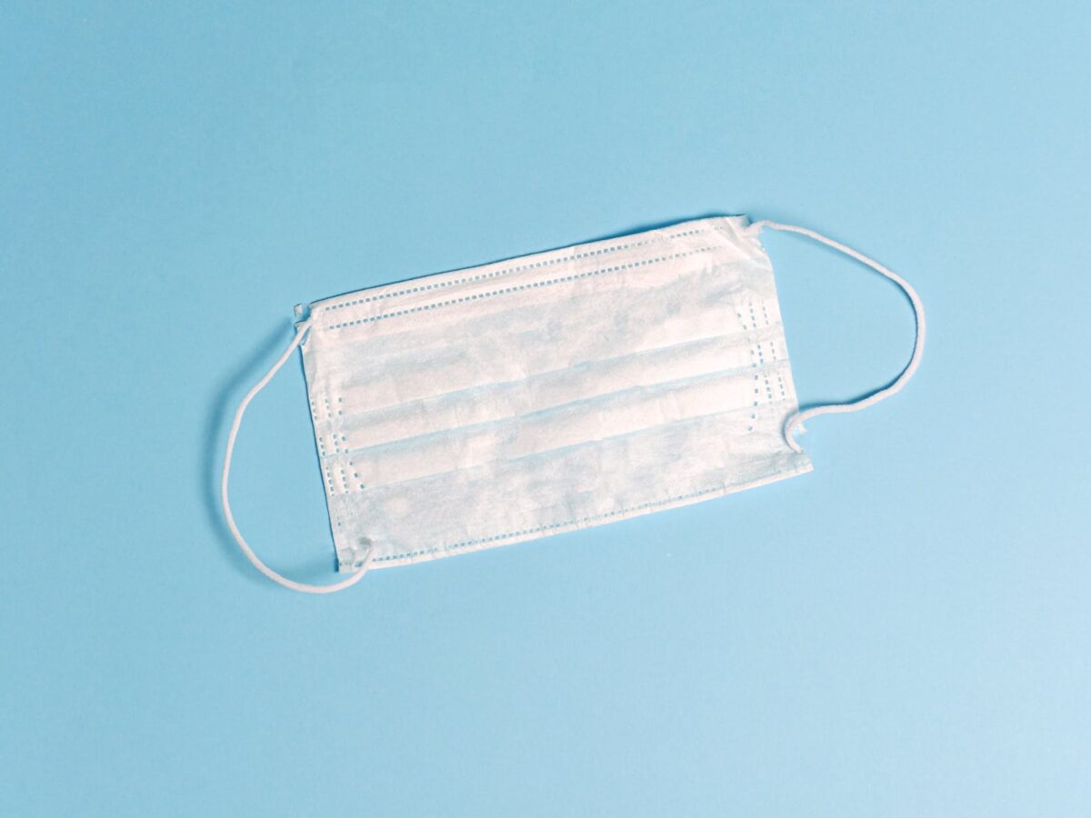 face mask on blue background